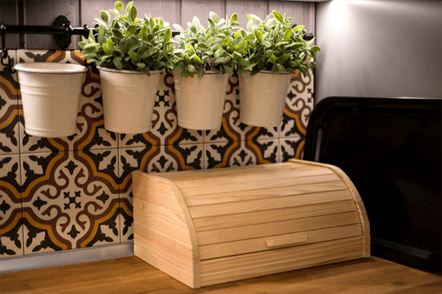 Nice wooden bread box in kitchen